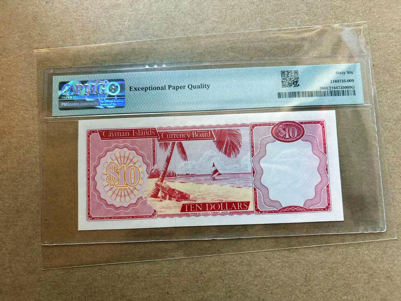 【Blue Auction】✨世界纸币精拍第565期【精】 【p3 A/1首发冠无47】开曼群岛 1971年10元 高冠女王 沙滩上宝箱 PMG66EPQ 