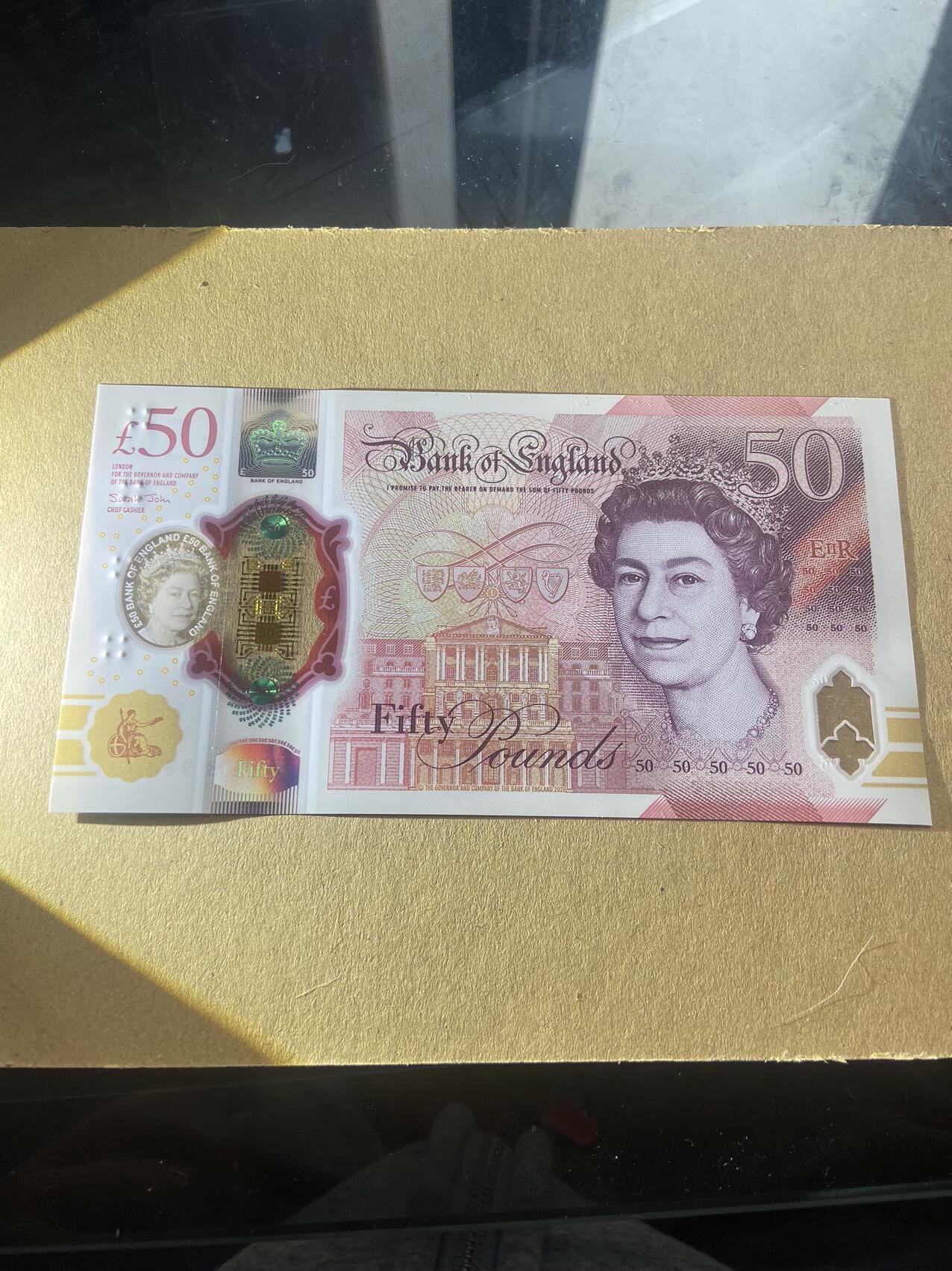 【炜奕收藏】，第十七期 英国G序列50磅，UNC品相