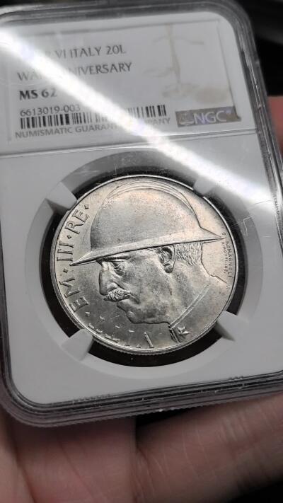 FXS世界钱币微拍第二百八十七期 荐！1928意大利纪念一战10周年20里拉大银NGC-MS62，消防员头盔的经典图案，背面铭文：“宁做一天雄狮，不做白日绵羊”