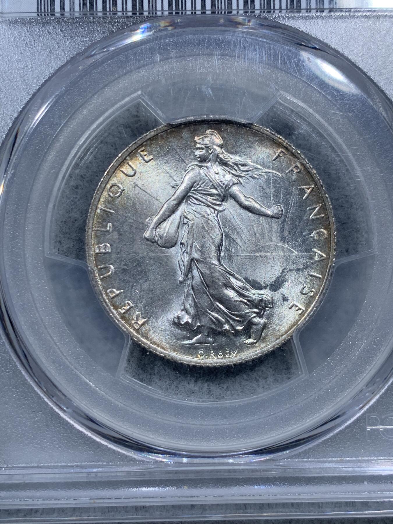 《竞宝斋》第322场 周日，周一，2场连拍 （全场包邮） PCGS MS64 法国1917年播种女神2法郎银币，充分流通品种，罗蒂经典设计。正面完美霜银光，背面原味卷首黑彩。能给重彩包浆币到64分，表明了评级师充分的认可