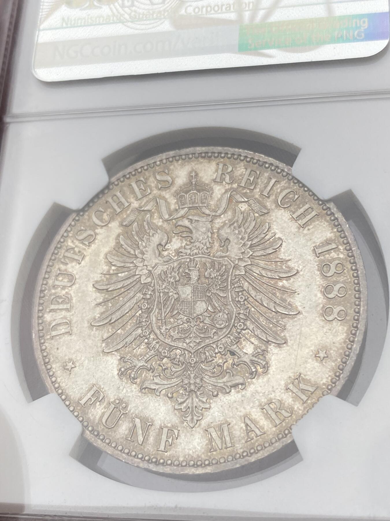万国钱币拍卖第036期 NGC MS65 1888年德国普鲁士三皇之年腓特烈三世短翅5马克 完美转光品相 淡彩粉光