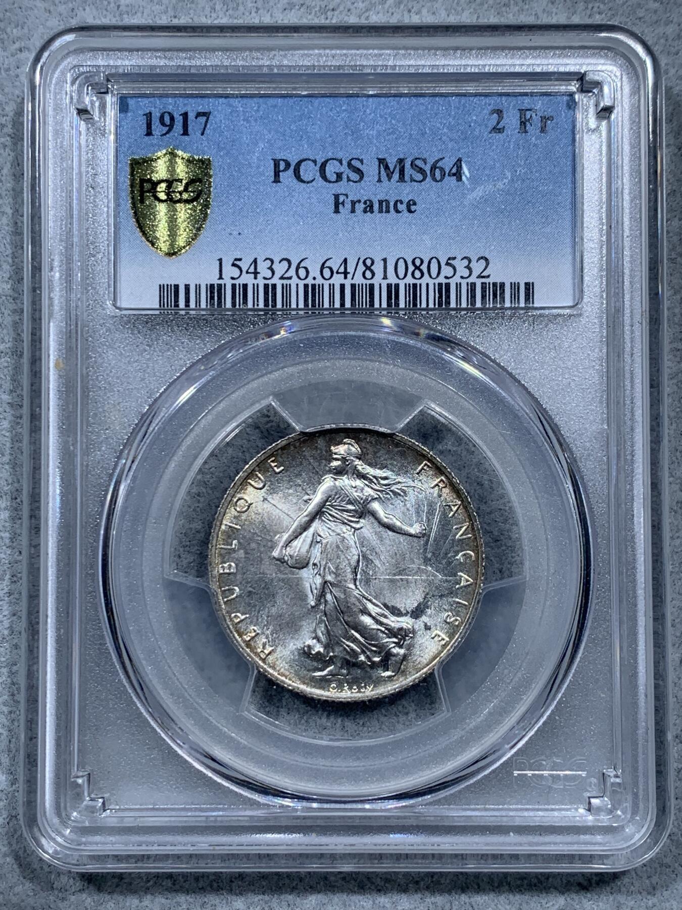 《竞宝斋》第322场 周日，周一，2场连拍 （全场包邮） PCGS MS64 法国1917年播种女神2法郎银币，充分流通品种，罗蒂经典设计。正面完美霜银光，背面原味卷首黑彩。能给重彩包浆币到64分，表明了评级师充分的认可