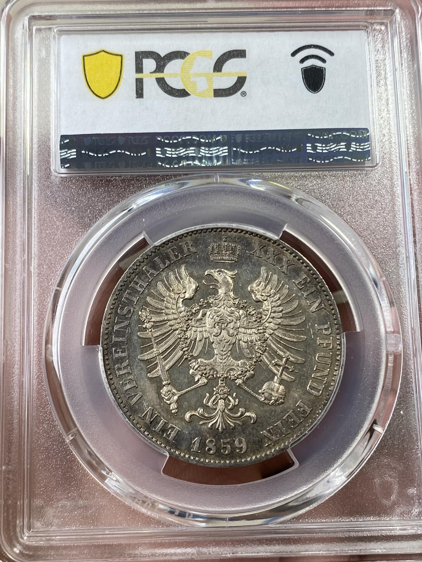 万国钱币拍卖第036期 PCGS MS62 1859年德国普鲁士威廉四世离冠鹰流通1泰勒 欧洲环五彩 类镜面质感