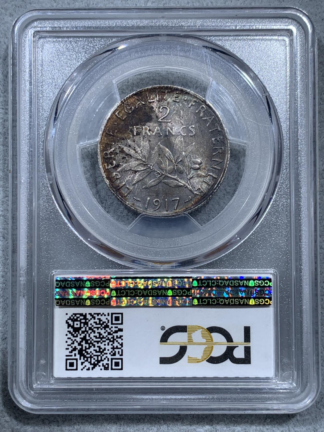 《竞宝斋》第322场 周日，周一，2场连拍 （全场包邮） PCGS MS64 法国1917年播种女神2法郎银币，充分流通品种，罗蒂经典设计。正面完美霜银光，背面原味卷首黑彩。能给重彩包浆币到64分，表明了评级师充分的认可