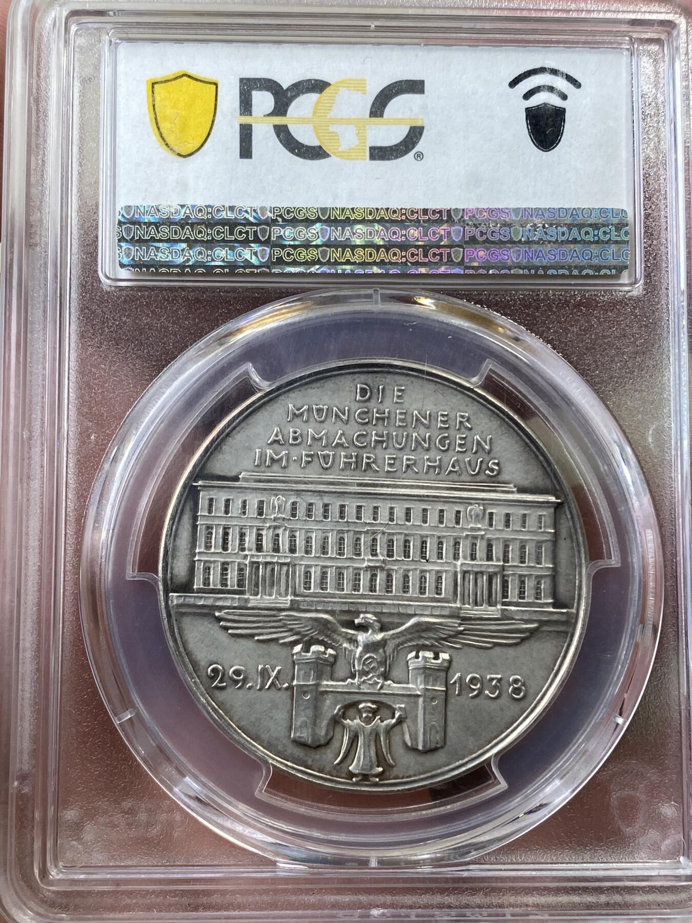 万国钱币拍卖第036期 PCGS SP63 1938年德国慕尼黑协定纪念银章 卡尔哥茨顶级名誉品种 1938年9月29日至30日英国、法国、纳粹德国、意大利四国首脑张伯伦、达拉第、胡子、墨索里尼在慕尼黑会议上签订条约 英法畏战牺牲捷克斯洛伐克利益 将苏台德区割让给德国