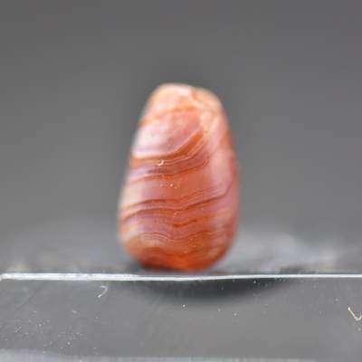 【良泉】第二十期，184组近代机制币、古代打制币、早期纸币、古籍手稿杂项等，12月5日晚19.30点开拍！ - 距今约两千年【西亚】水滴形，红玉髓玛瑙珠饰，高约9毫米