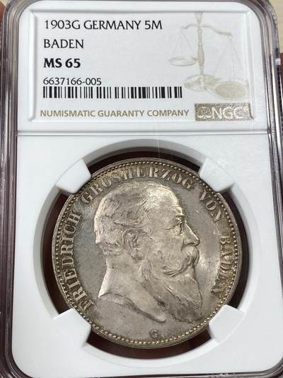 万国钱币拍卖第036期 - NGC MS65 1903年德国巴登长翅流通5马克 全原光丝滑底板搭配原味淡五彩包浆，这种品质的流通版巴登大胡子不是那么容易能遇到的，NGC冠军分。