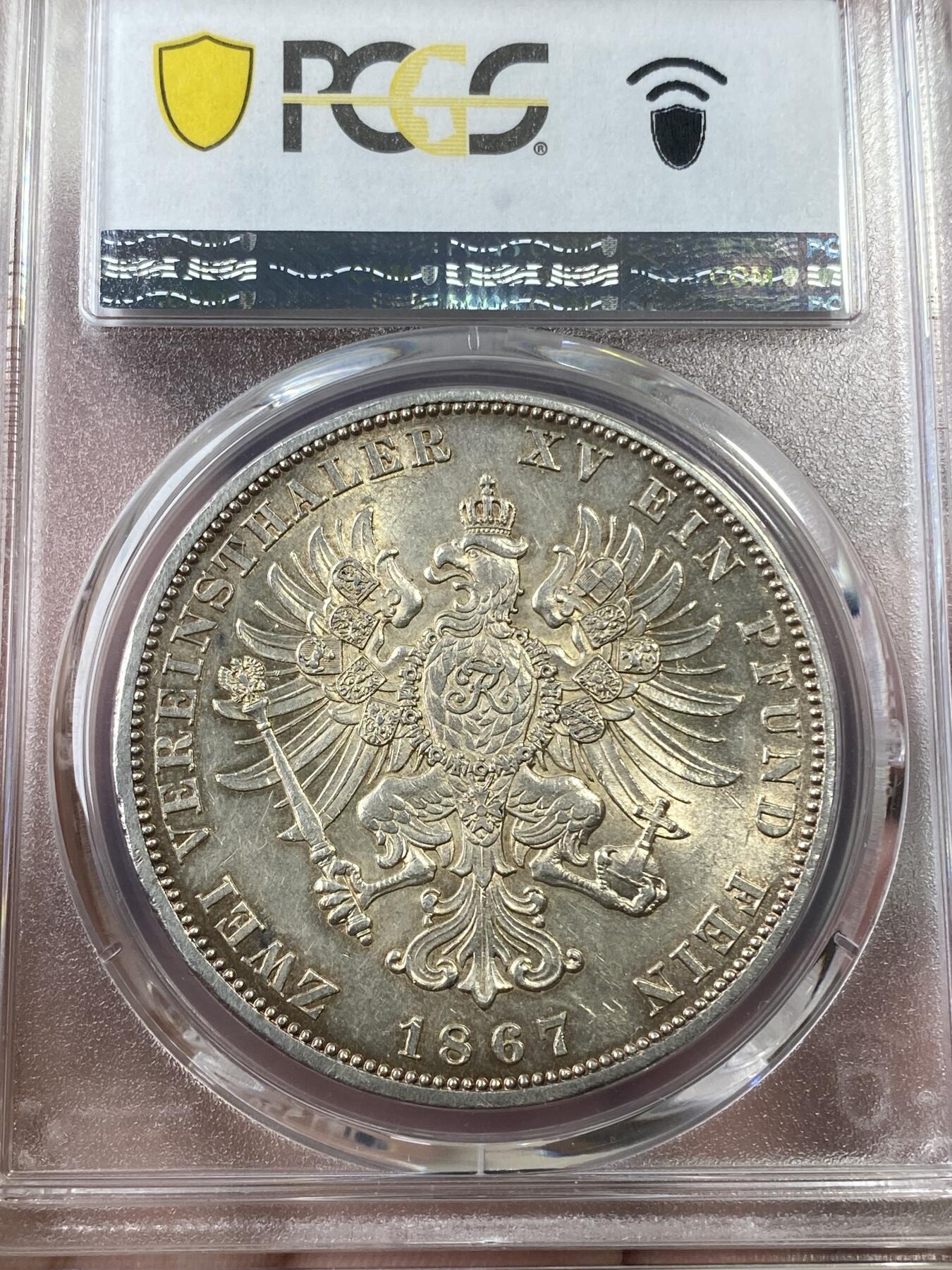 万国钱币拍卖第036期 PCGS AU58 1867年德国普鲁士威廉一世经典大鸟流通2泰勒 环金彩名誉品种