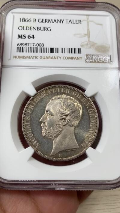 万国钱币拍卖第036期 NGC MS64 1866年德国欧登堡盾徽流通1泰勒 小邦名誉品种 BU难度奇大 玫瑰淡彩 堪称最为精美的邦徽泰勒之一