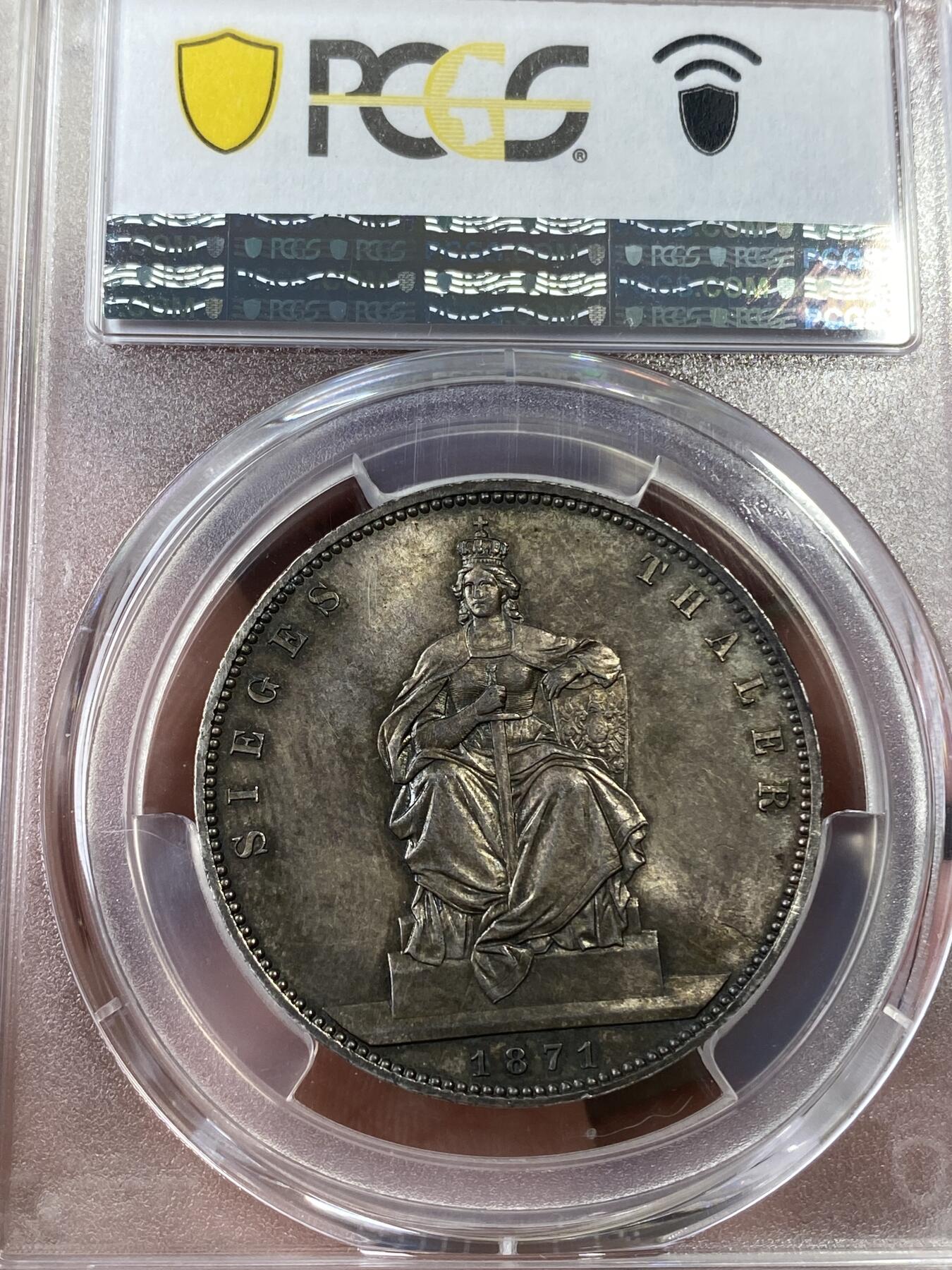 万国钱币拍卖第036期 PCGS MS64 1871年德国普鲁士普法战争胜利纪念流通1泰勒 原味高分黑金彩极其难得 女武神五官细节纤毫毕现