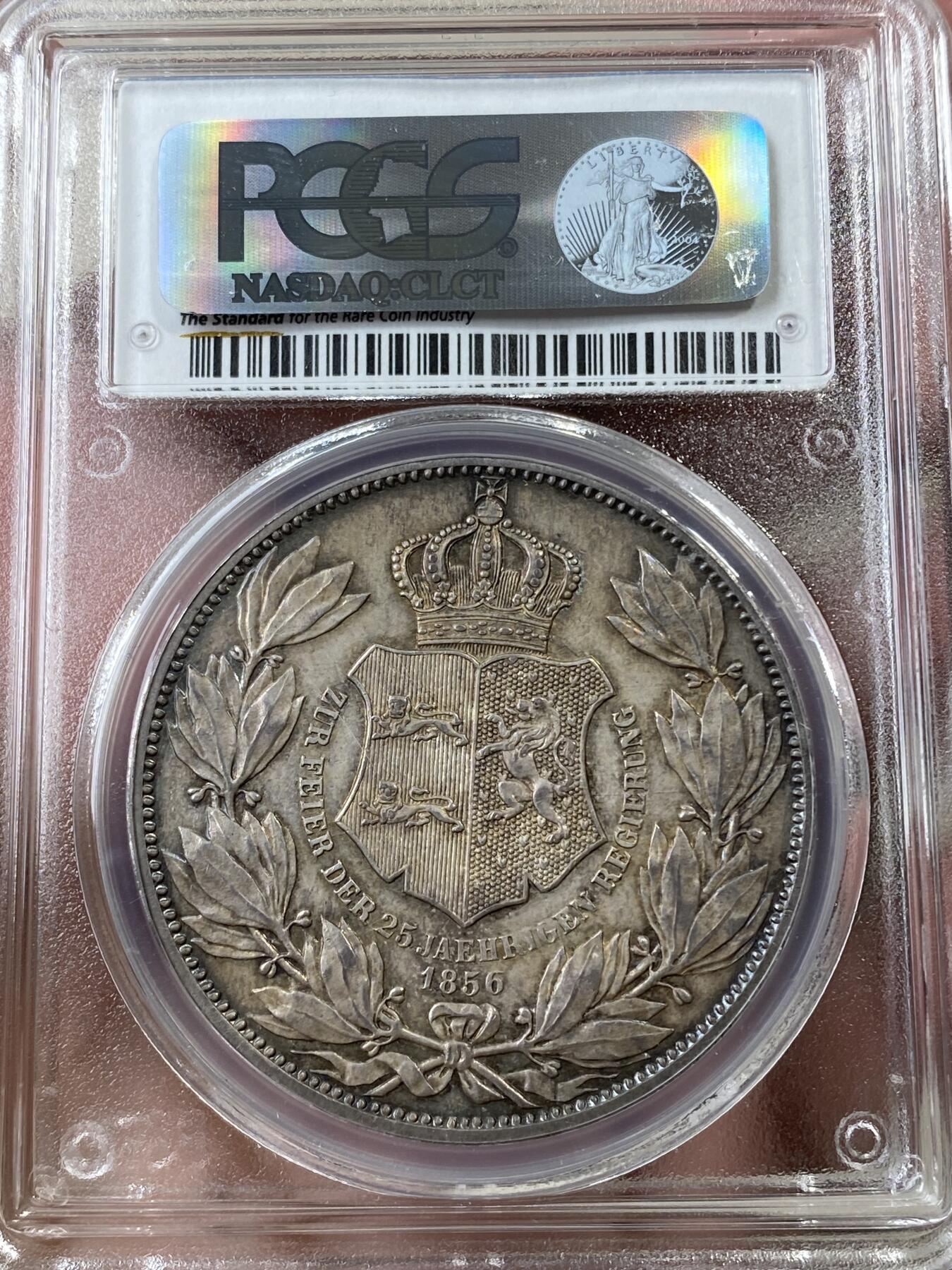 万国钱币拍卖第036期 PCGS AU58 1856年德国不伦瑞克-狼堡加冕25周年纪念流通2泰勒 经典登基品种 铸造精良 通体酱彩