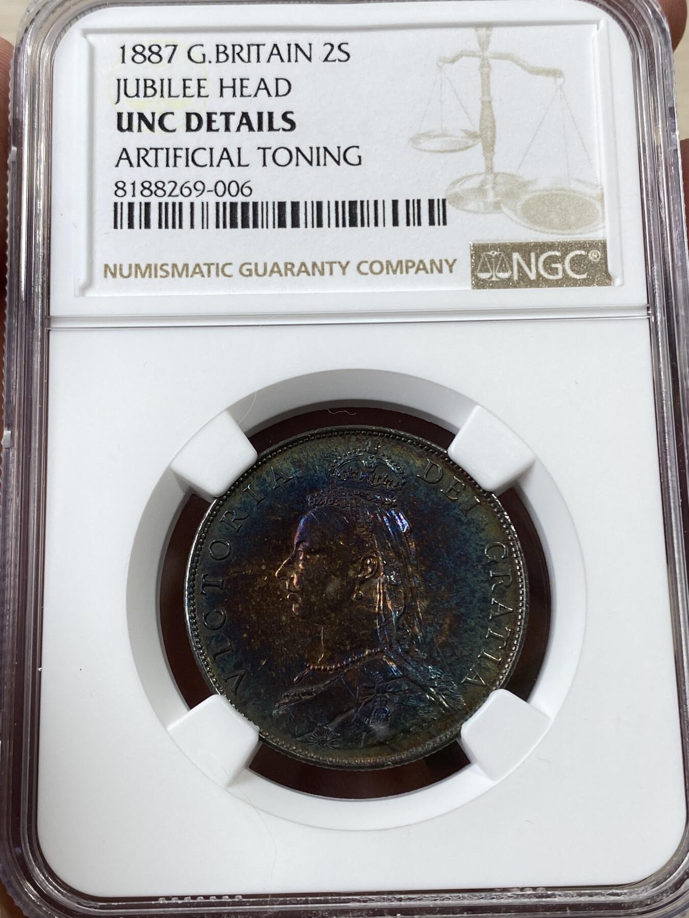 万国钱币拍卖第036期 NGC UNCD 1887英国维多利亚2先令银币 深五彩