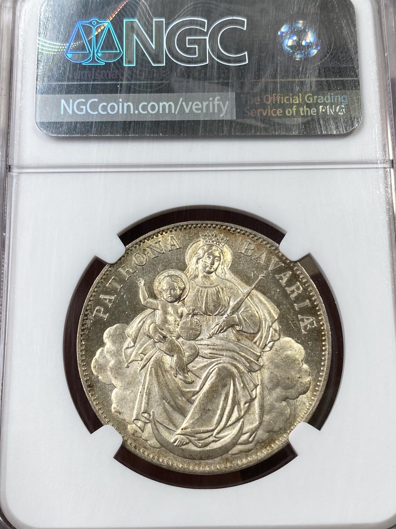 万国钱币拍卖第036期 NGC MS63 1865年德国巴伐利亚路德维希二世圣母抱婴流通1泰勒 转光金彩 类镜面质感