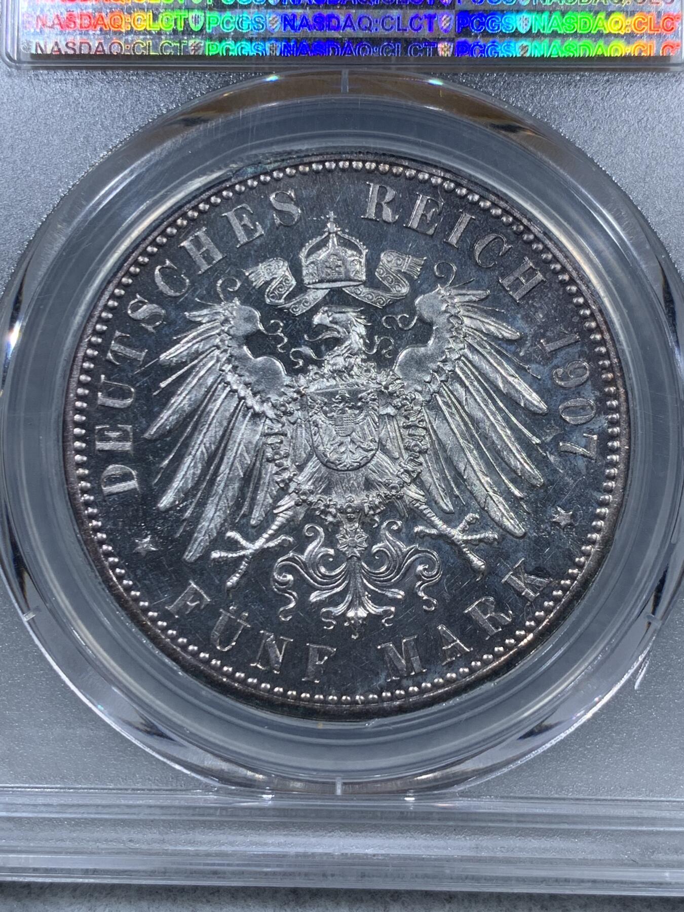 《竞宝斋》第323场 周日，周一，2场连拍 （全场包邮） PCGS PR62CAM 德国1907年普鲁士精制5马克银币，精制币的铸造可能是为了馈赠，展示或者存档，未养护五彩包浆评上CAM比较难得。流通币的精制版通常比纪念币要稀有。