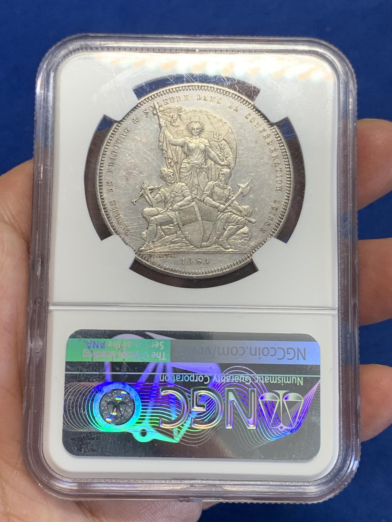 《竞宝斋》第323场 周日，周一，2场连拍 （全场包邮） NGC UNC 瑞士1881 弗里堡射击节5法郎大银币，景观不错，精美的瑞士币种
