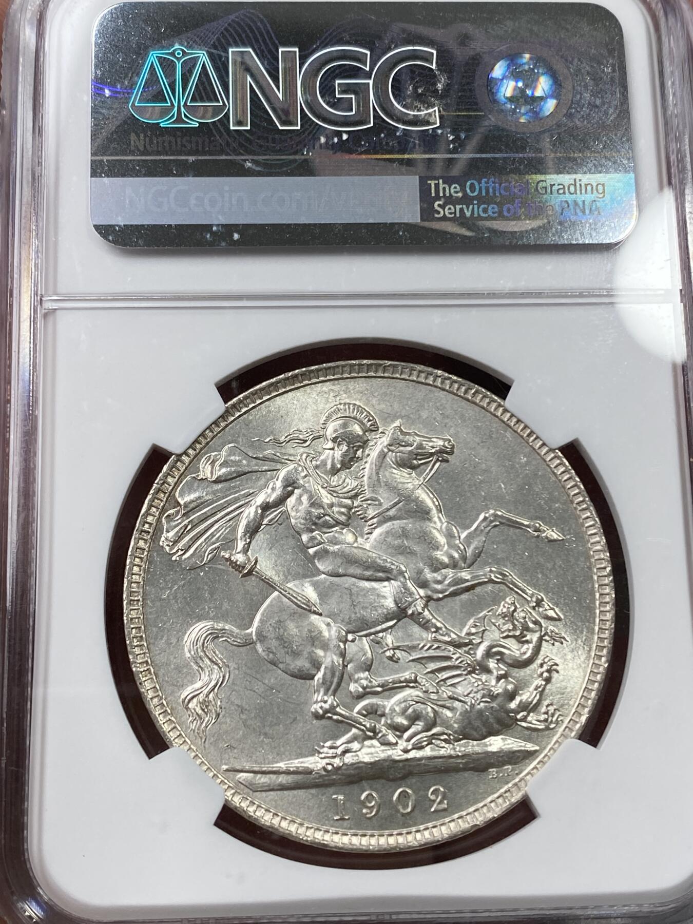 万国钱币拍卖第036期 NGC MS64 1902英国爱德华七世马剑克朗 十字转光 普制BU难度极大