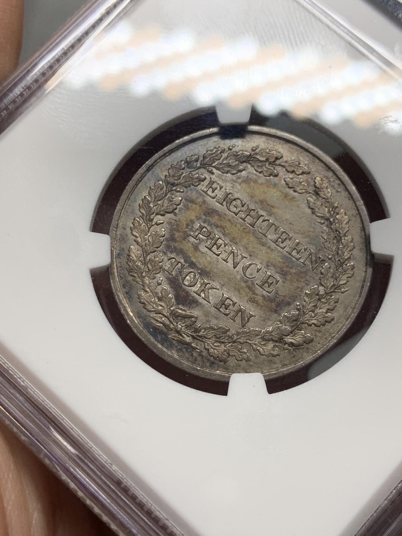 《竞宝斋》第323场 周日，周一，2场连拍 （全场包邮） 稀有 NGC MS63 英属 泽西岛 1813年 18便士银行银代币 是泽西岛铸造的第一批官方硬币 由皇家铸币厂根据 1813 年 2 月 5 日硬币委员会枢密令铸造，由首席雕刻师 Thomas Wyon Jr. 设计