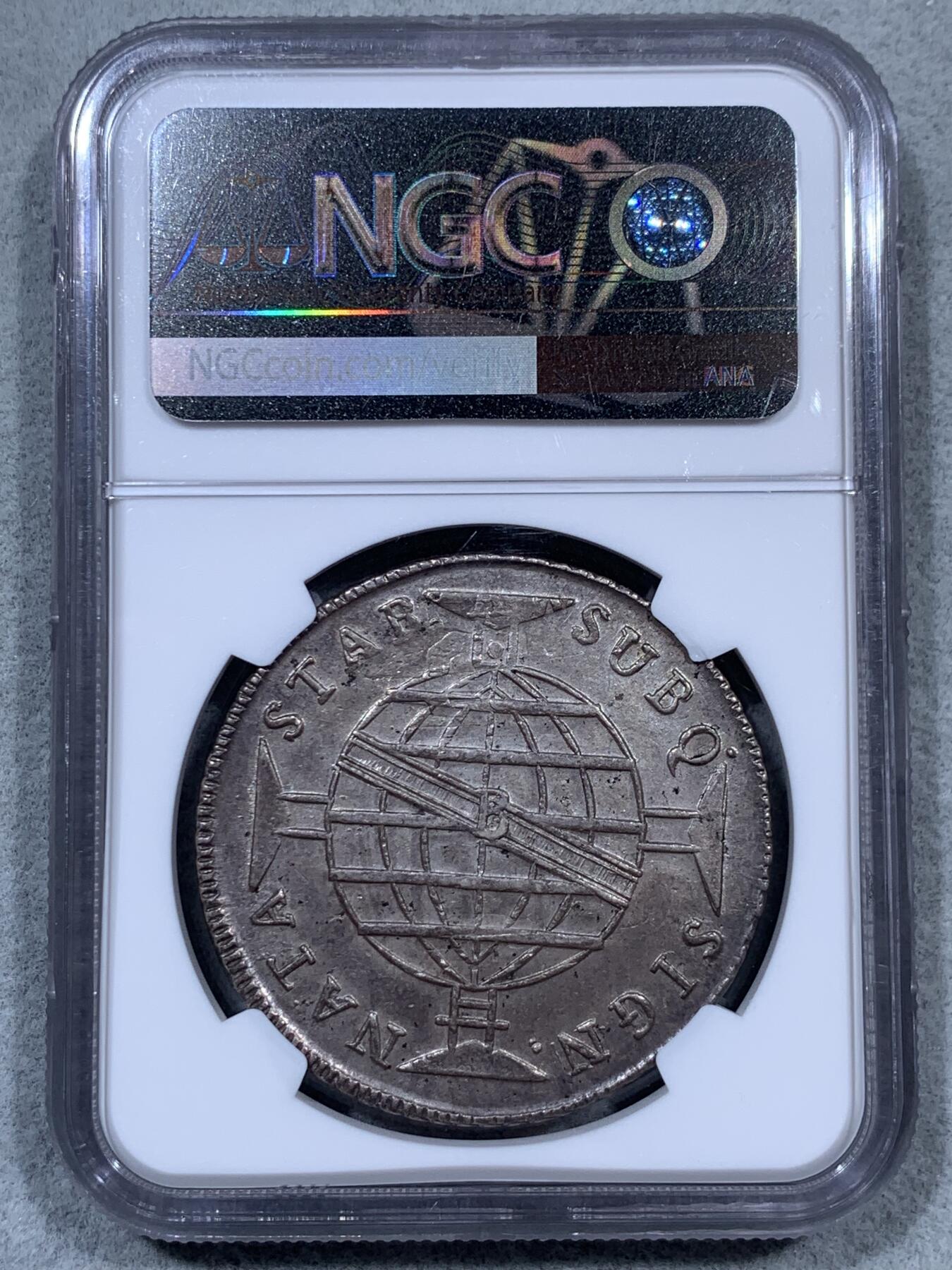《竞宝斋》第323场 周日，周一，2场连拍 （全场包邮） NGC MS62 葡属巴西 1815B 960瑞斯 大银币 此币正反面均深打，尤其背面地球线条清晰，字母显示完整，葡属巴西不可多得的佳品