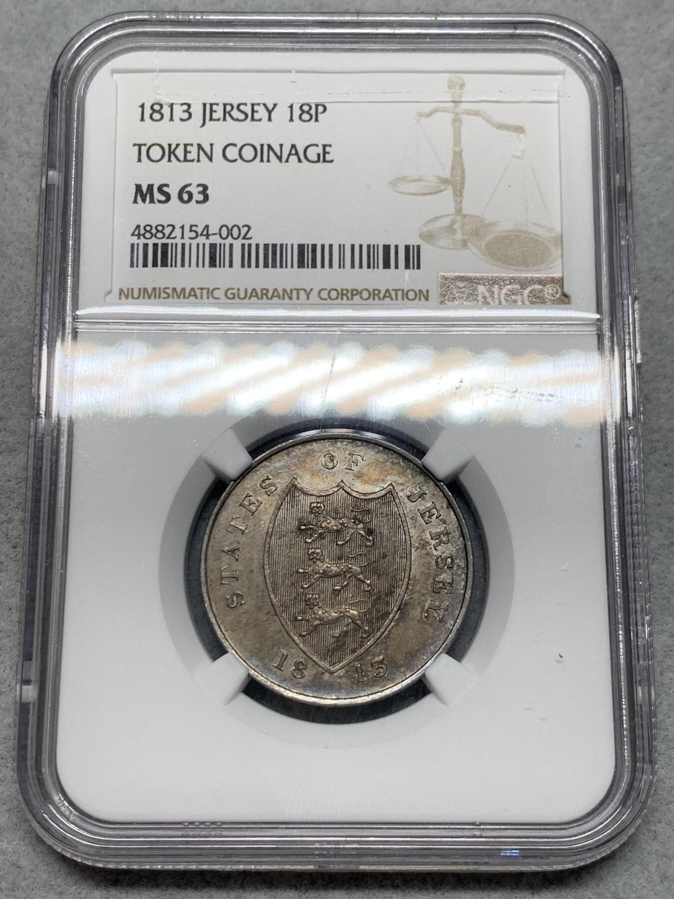 《竞宝斋》第323场 周日，周一，2场连拍 （全场包邮） 稀有 NGC MS63 英属 泽西岛 1813年 18便士银行银代币 是泽西岛铸造的第一批官方硬币 由皇家铸币厂根据 1813 年 2 月 5 日硬币委员会枢密令铸造，由首席雕刻师 Thomas Wyon Jr. 设计