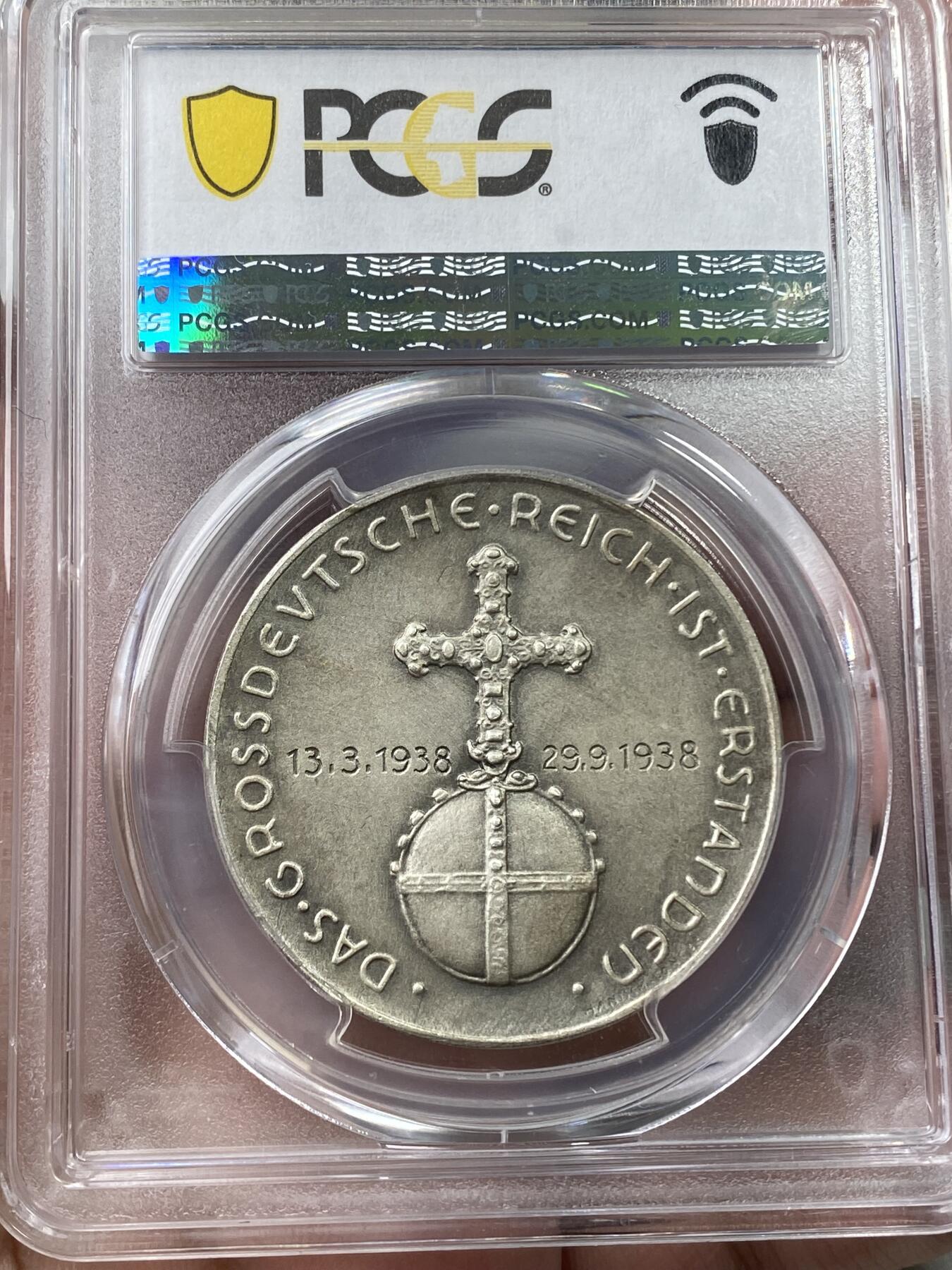 万国钱币拍卖第036期 PCGS SP65 1938年德国民族社会主义工人党党魁纪念吞并奥地利银章 顶级状态 磨砂五彩 可遇不可求的品质 PC冠军分