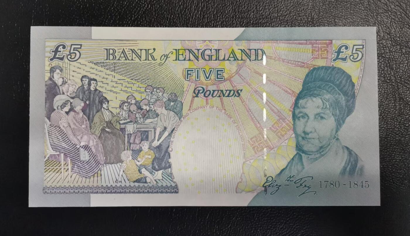 《张总收藏》173期-周日外币精选 英国E序列再版2002年5镑首发HA01冠千位7765号UNC-正面紫光灯下有轻微斑