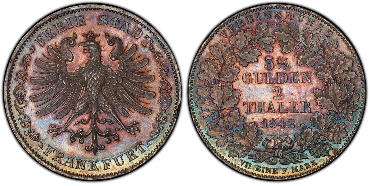 万国钱币拍卖第036期 PCGS MS64 1842法兰克福鹰徽2泰勒 不多见的鹰徽与面值的组合，流通充分品种，难度要比同分少女2泰勒大的多，华丽七彩转光，高分2t价格持续走高，PCGS唯一亚军分，更高分仅一枚。