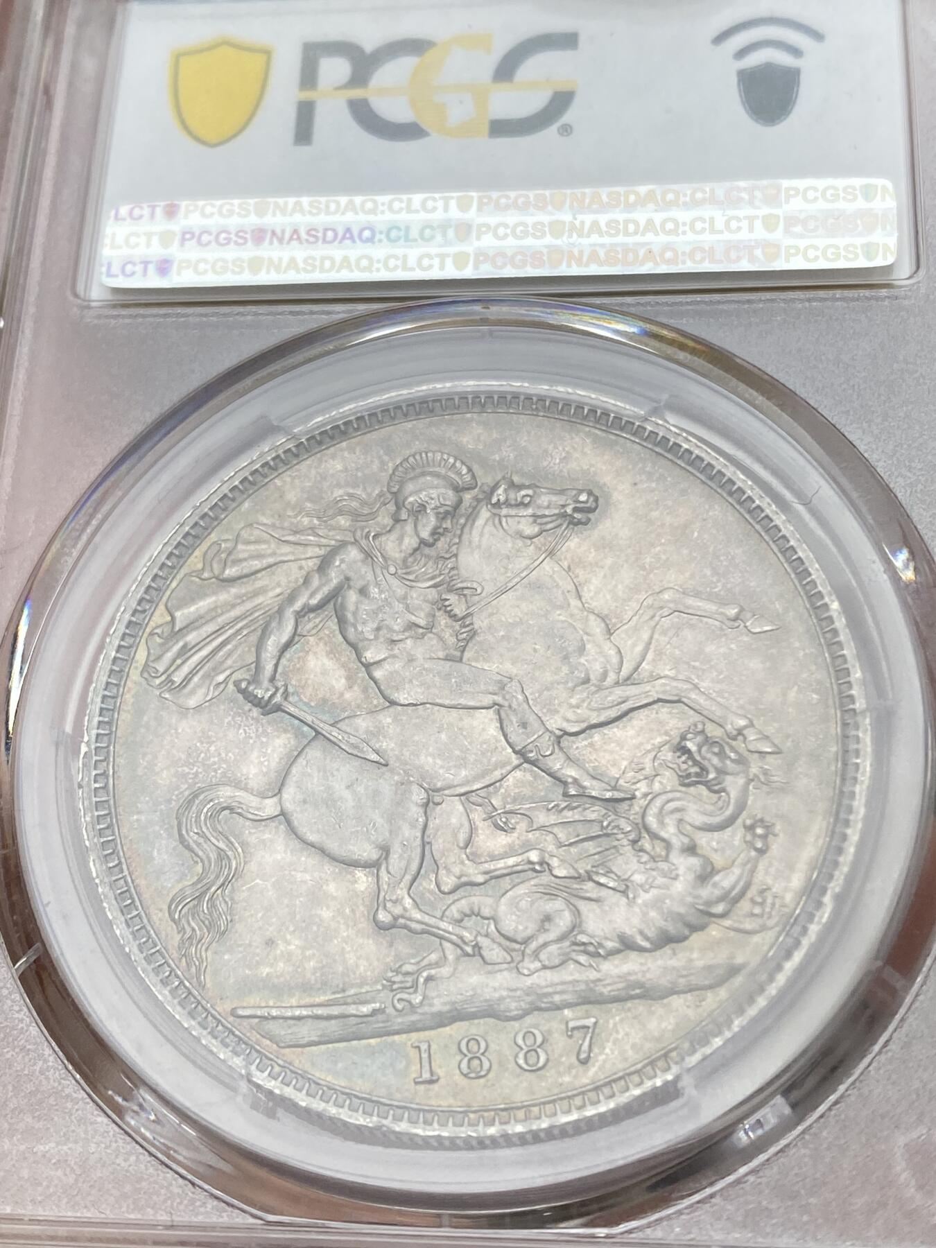 万国钱币拍卖第036期 PCGS MS62 1887英国维多利亚高冠马剑克朗 原味五彩 观感超越分数的状态