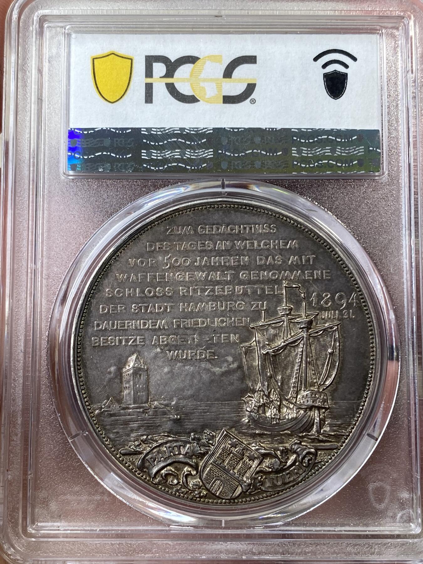 万国钱币拍卖第036期 PCGS SP63 1894德国纪念里策布特尔城堡并入汉堡500周年纪念大银章  43MM 30G 该城堡最早可追溯至北欧少数族裔萨米人于1340年前后建立的一座坚固的建筑-‘斯坦堡’，后来汉堡人1394年购买了该城堡，此后500多年此城堡一直是汉堡的飞地。原味黑漆古包浆，十分精美，PCGS唯一亚军分。