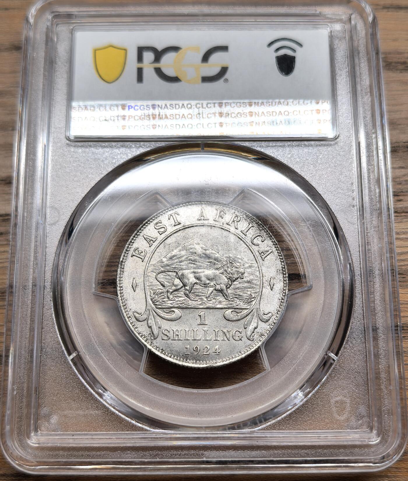 凡希社世界钱币微拍第二百八十八期迷你精品拍 1924英属东非乔五先令银币PCGS-MS62原银光品。