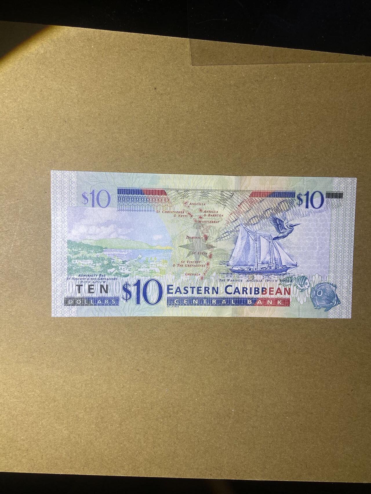 【炜奕收藏】，第十八期 东加勒比10元纸币，老年女王头像，UNC品相