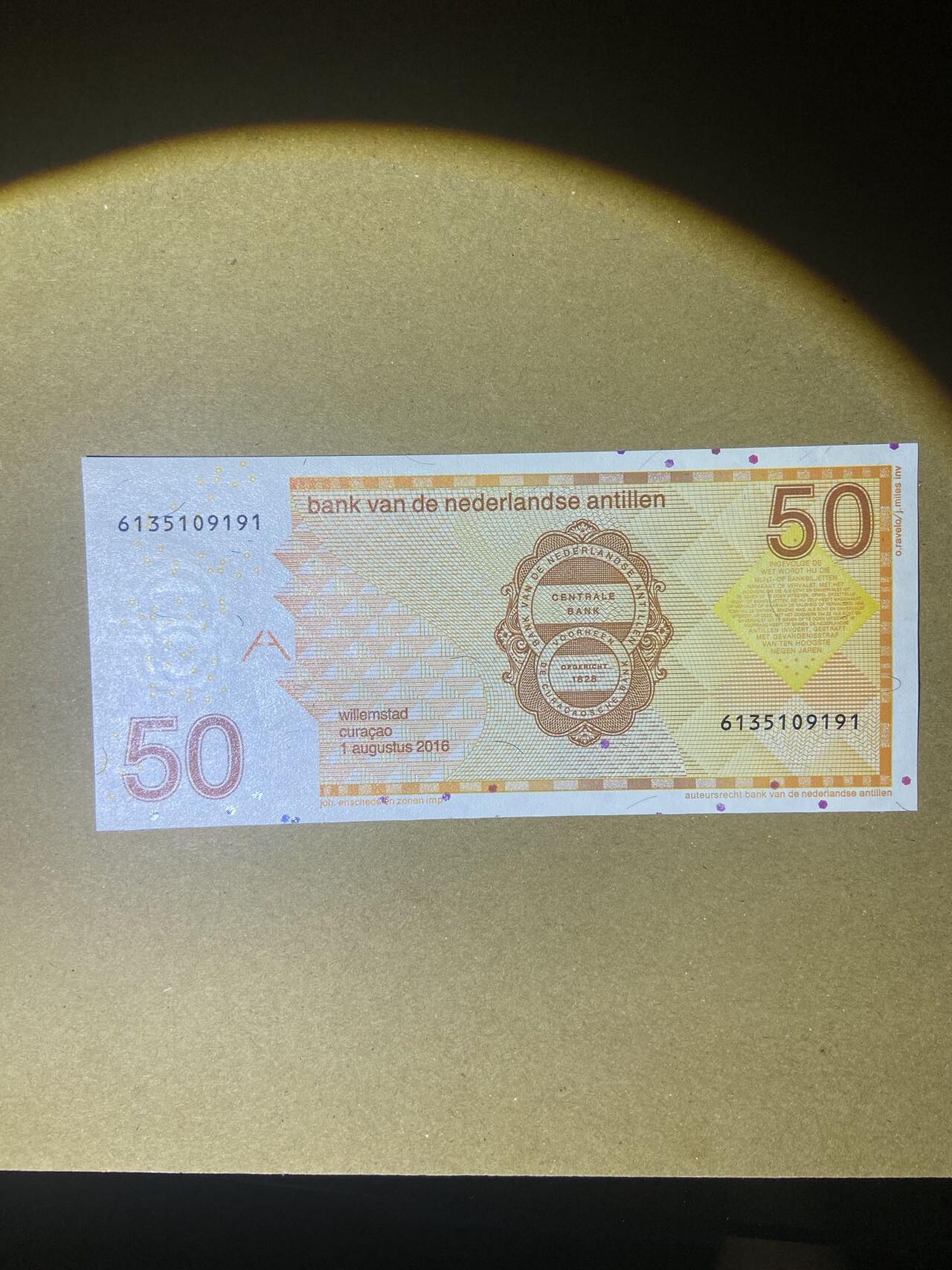 【炜奕收藏】，第十八期 荷属安德烈斯50盾，UNC品相，号码无47