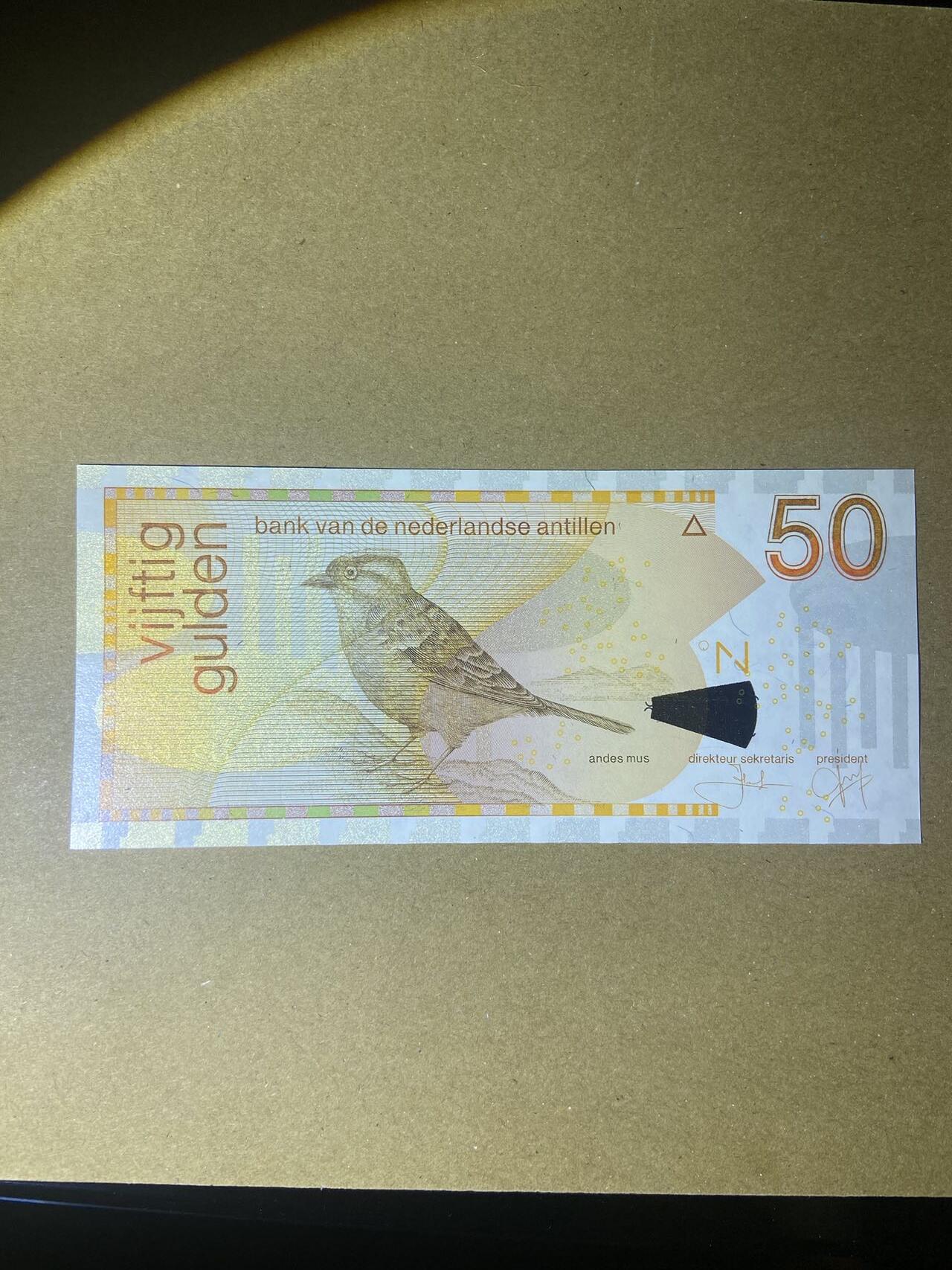【炜奕收藏】，第十八期 荷属安德烈斯50盾，UNC品相，号码无47