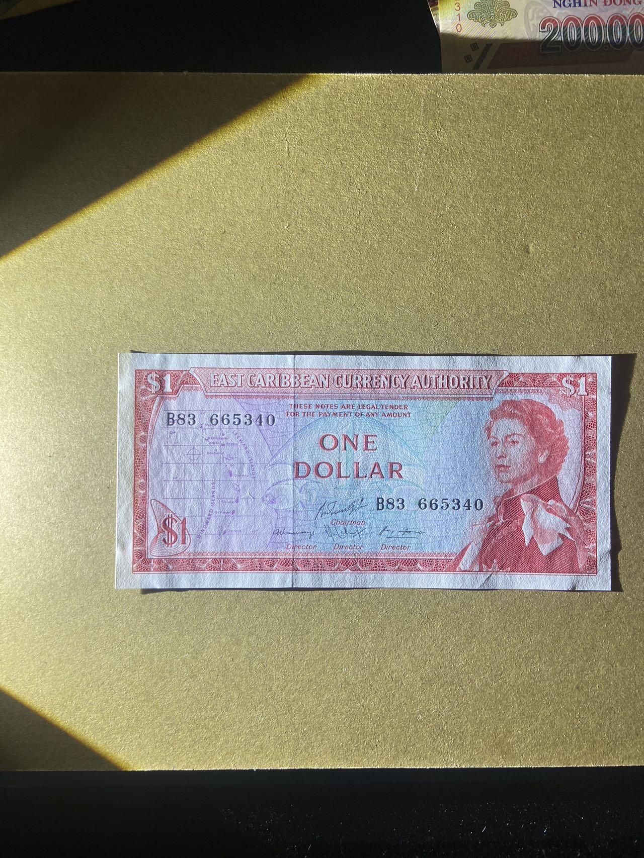 【炜奕收藏】，第十八期 东加勒比戎装女王1元纸币，UNC-品相，邮封拆封