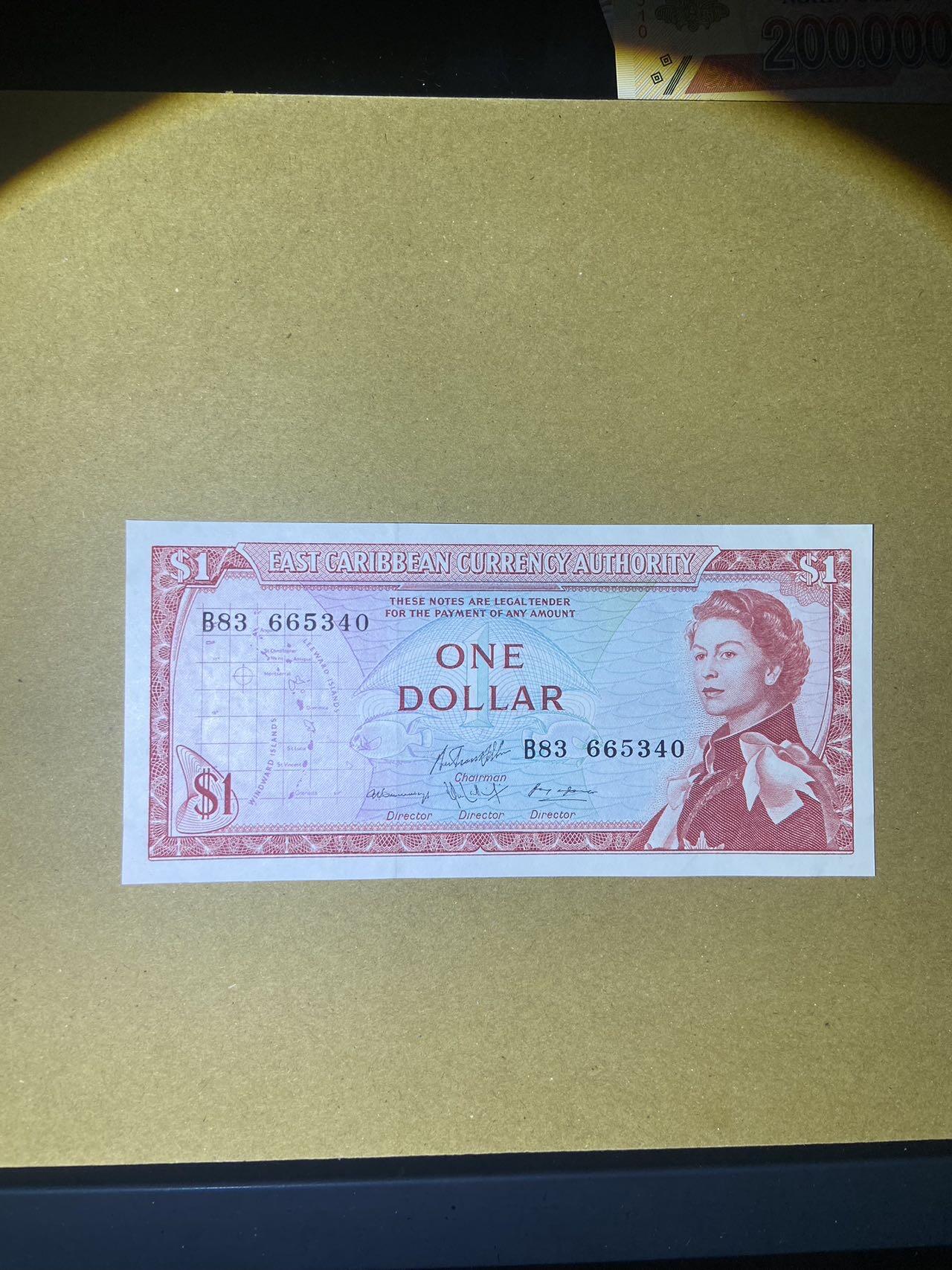 【炜奕收藏】，第十八期 东加勒比戎装女王1元纸币，UNC-品相，邮封拆封