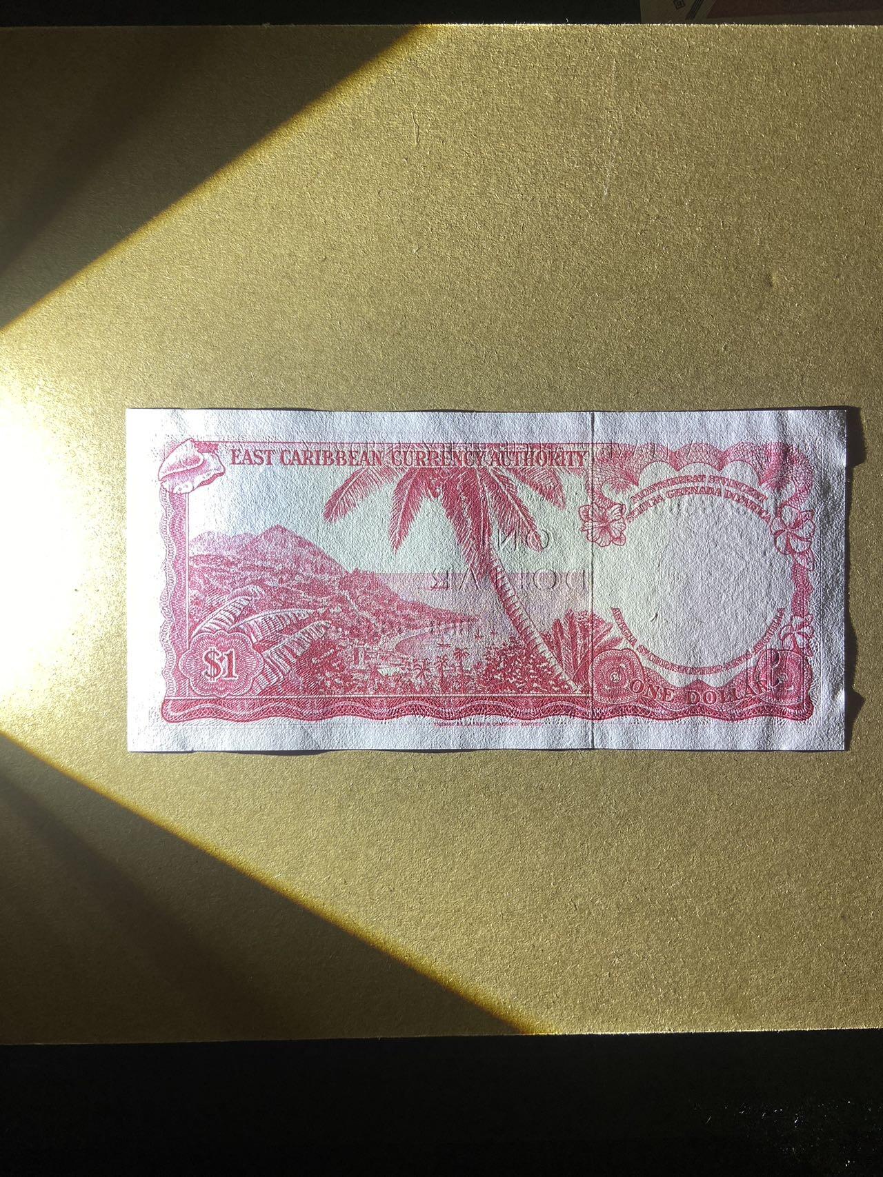 【炜奕收藏】，第十八期 东加勒比戎装女王1元纸币，UNC-品相，邮封拆封