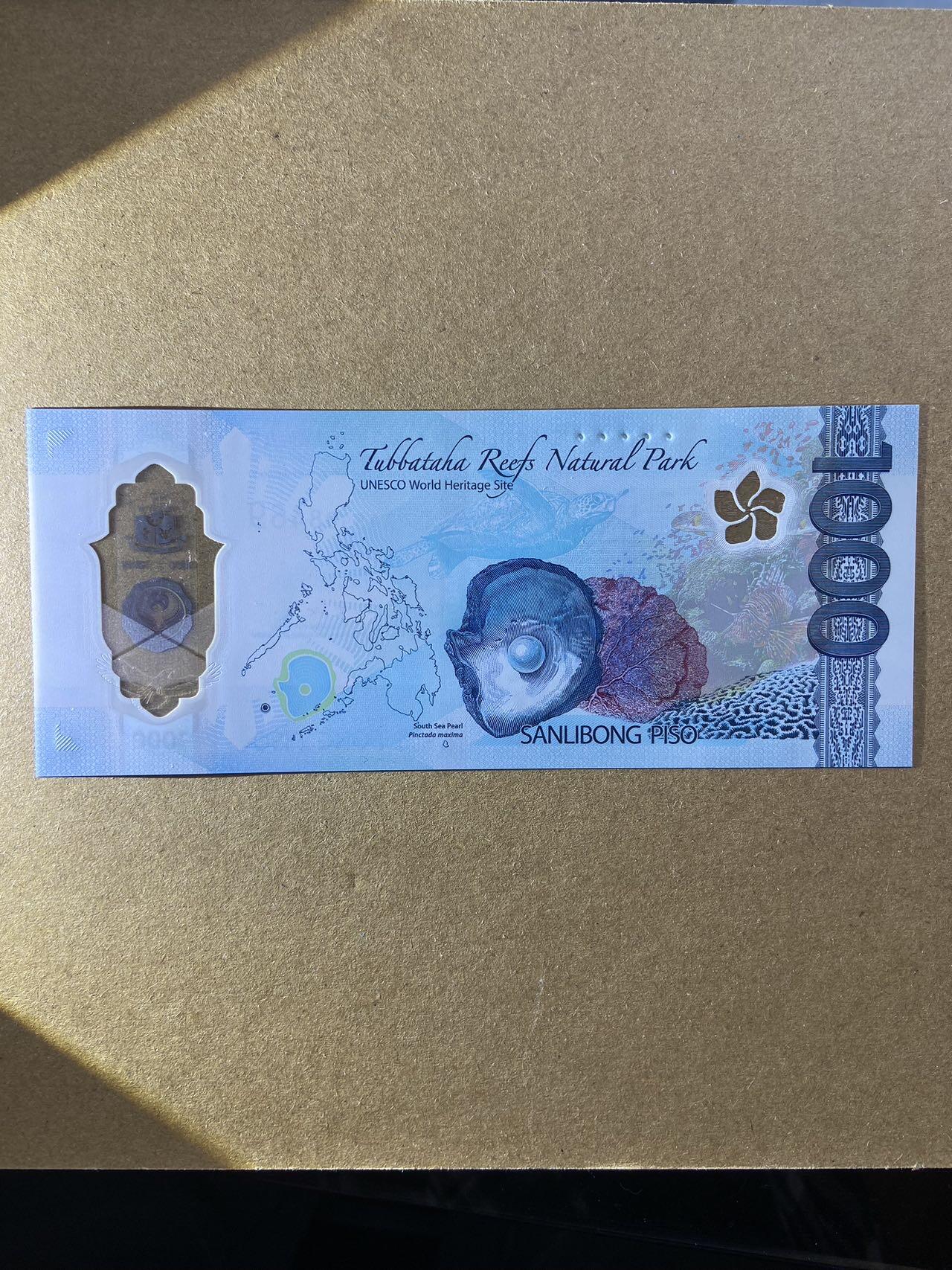 【炜奕收藏】，第十八期 菲律宾1000元塑料钞，UNC品相，AA冠，获奖钞