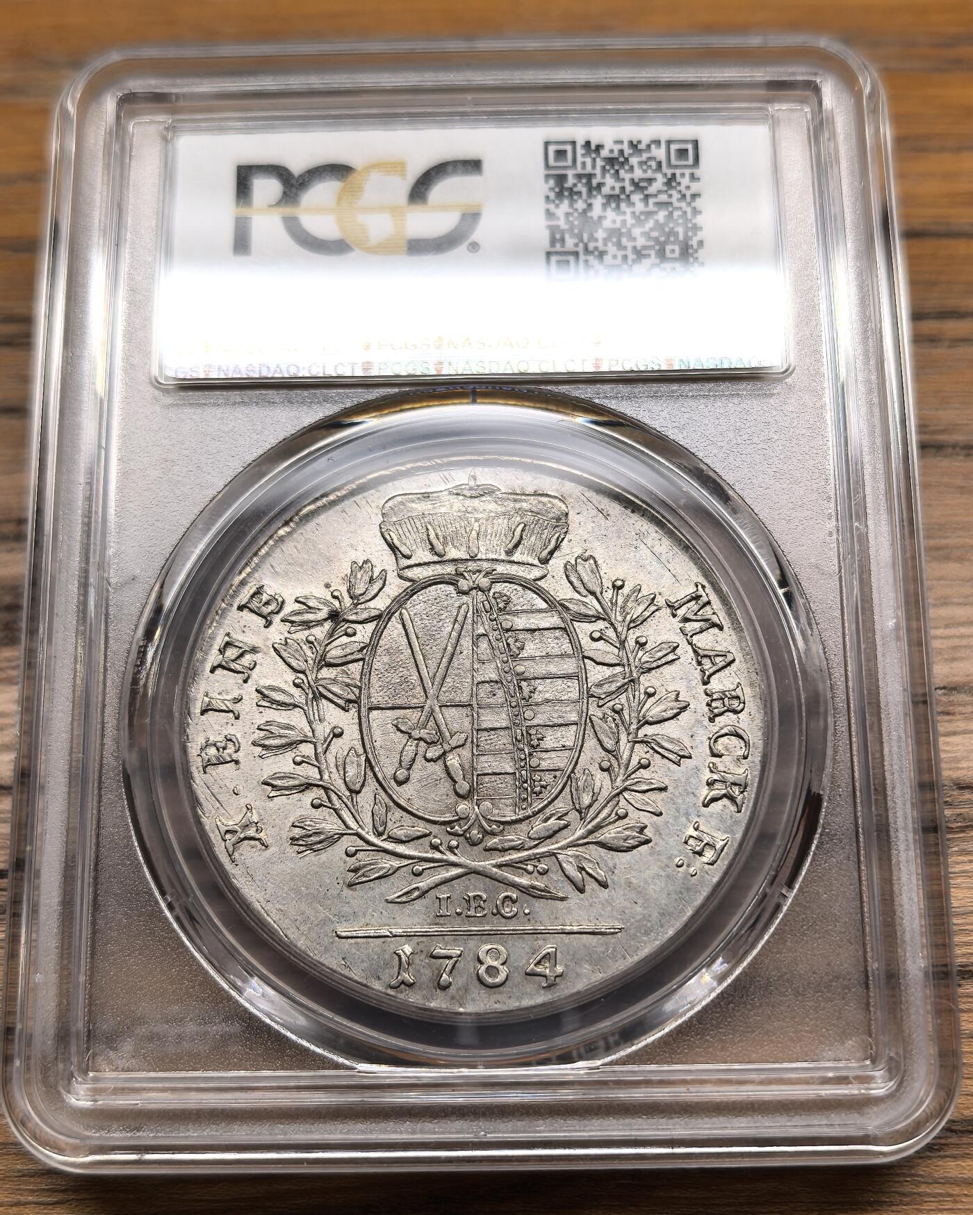 凡希社世界钱币微拍第二百八十九期 1784IEC德国萨克森选帝侯奥古斯塔盾徽泰勒大银PCGS-AU55，漂亮的淡紫金彩。(视频参考)
