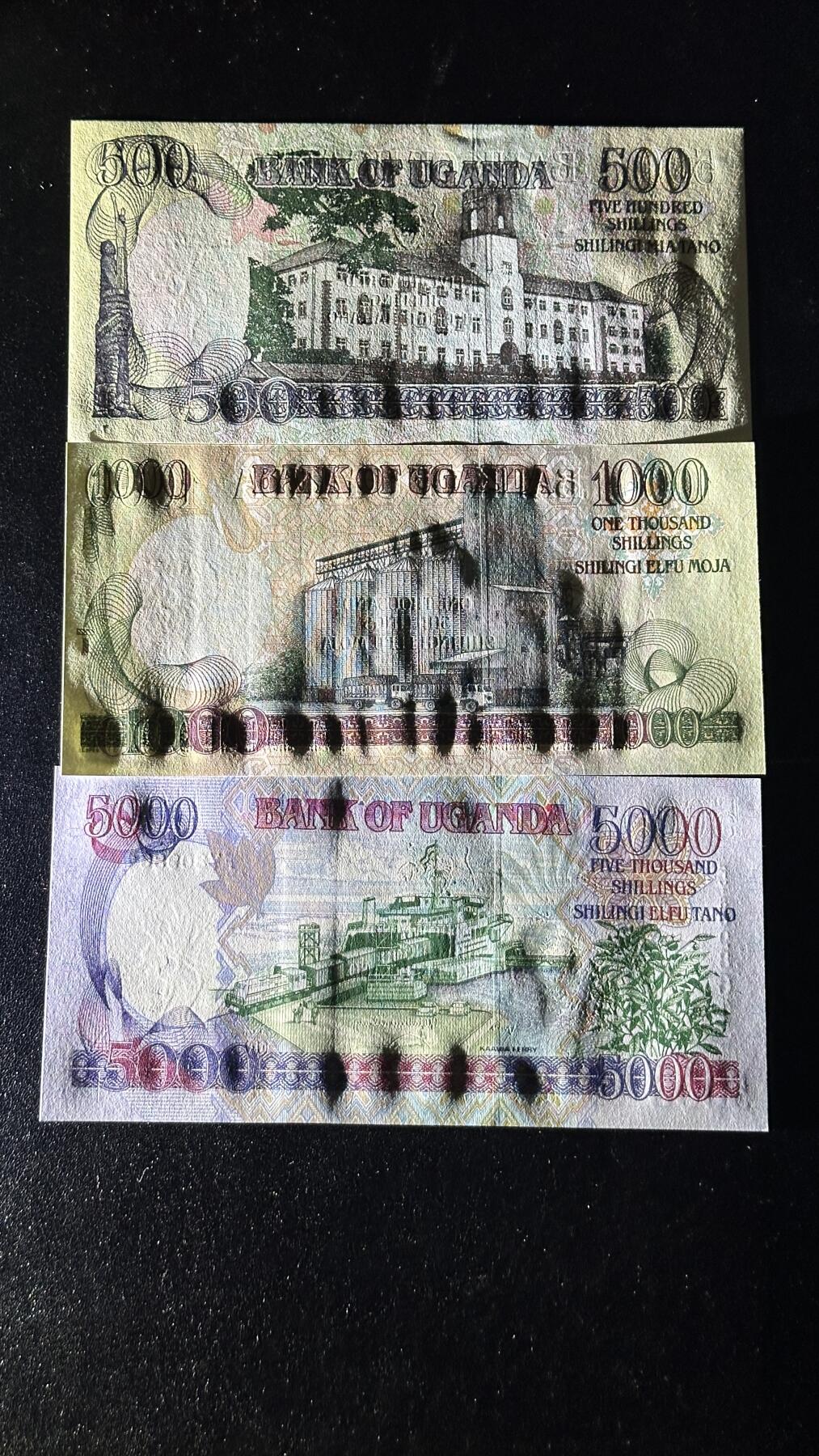 《外钞收藏家》第四百三十七期 乌干达500,1000,5000先令三枚 全新UNC