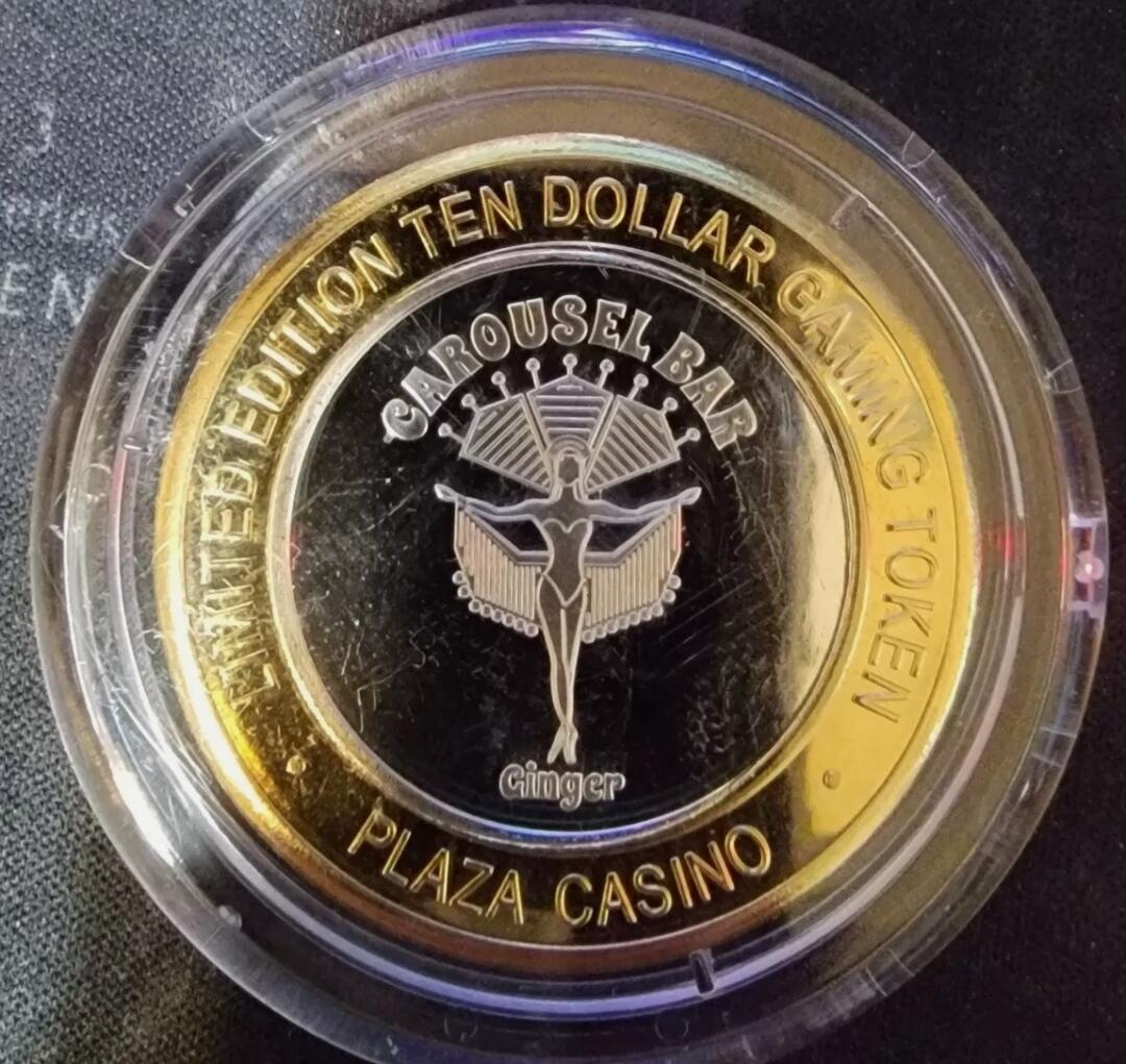 “旋转姜美人”双色银币（限量版）          美国10 Dollars 银币（拉斯维加斯“PLAZA PALACE”代币）。内圆白银，内径30mm，外环黄铜，外径42.5mm，总重量39克。
