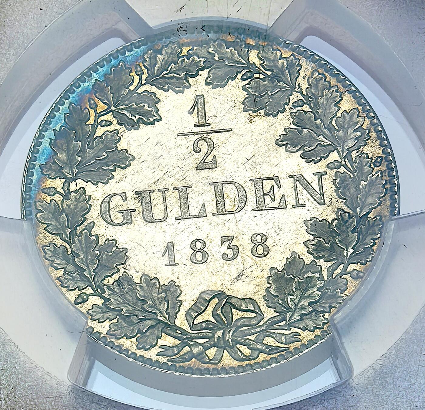 凡希社世界钱币微拍第二百八十九期 1838德国黑森达姆斯特1/2古尔登PCGS-MS65PL，极养眼的喷砂类镜面工艺，让人爱不释手的一枚南德盾。(视频参考)