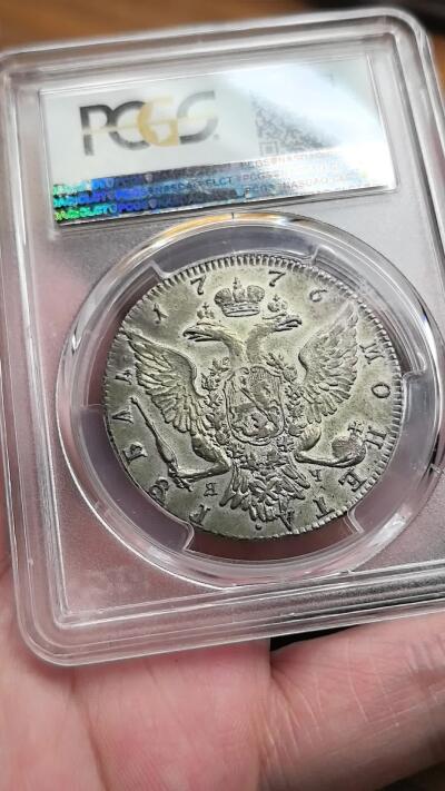 凡希社世界钱币微拍第二百八十九期 1776俄国叶卡捷琳娜大帝双头鹰卢布大银PCGS-AU55，全深打，高点几无磨损，底板极好，鹰羽细节出色，光泽柔美，必能引起俄系藏家的瞩目。(视频参考)