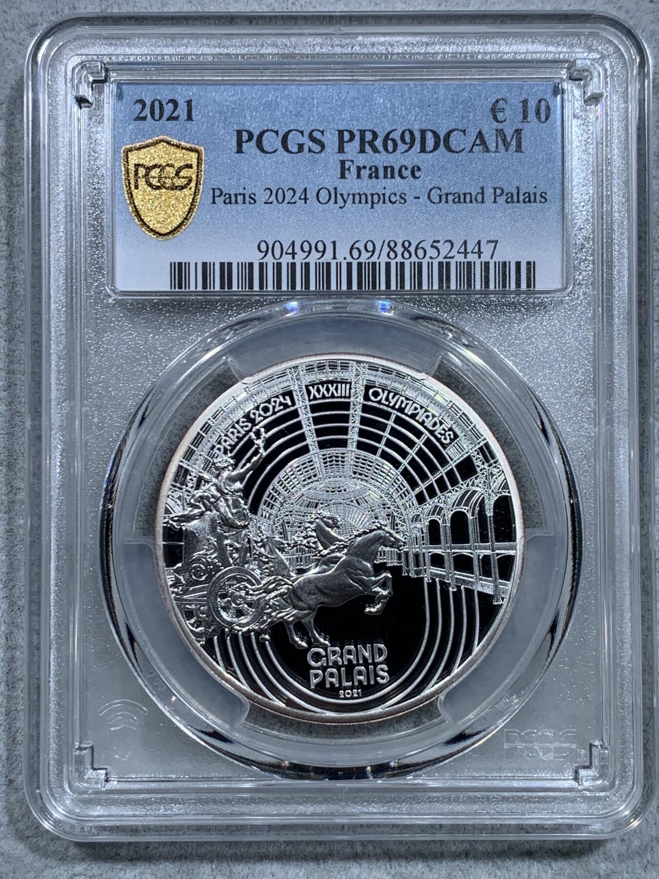 《竞宝斋》第326场 周日，周一，2场连拍 （全场包邮） PCGS PR69DCAM 法国2021年巴黎奥运会历史遗产系列-巴黎大皇宫10欧元精制纪念币（个人认为奥运会纪念币中最美丽的一枚，克重22.2克，999纯银，限量7500枚，盒证齐全）