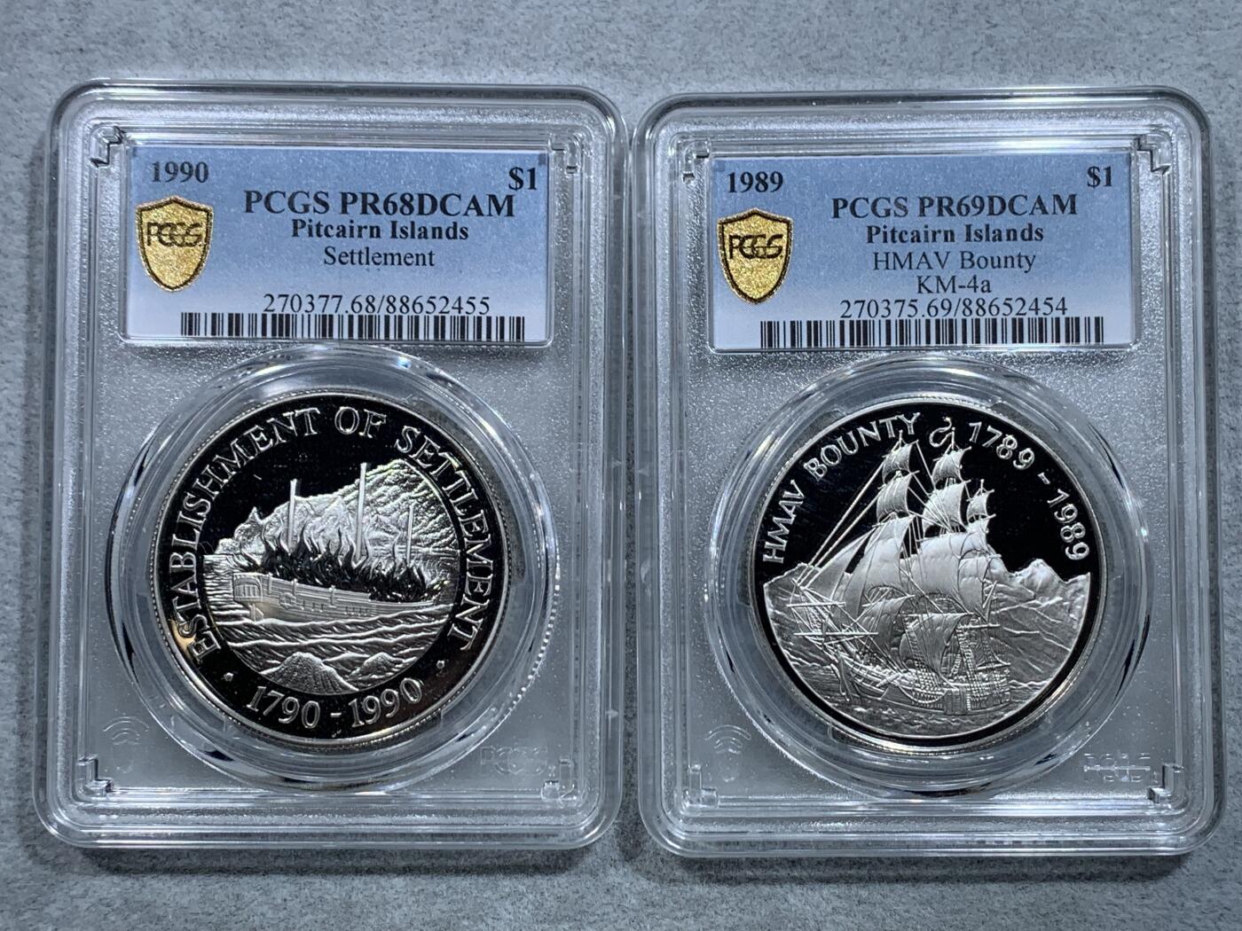 《竞宝斋》第326场 周日，周一，2场连拍 （全场包邮） PCGS PR68DCAM/PR69DCAM 皮特凯恩岛1990年/1989年“班蒂号”精制纪念套币一对（重28.26/枚，925银，银币主题取材来源于真实历史事件“叛舰喋血记”，极具投资收藏价值！）