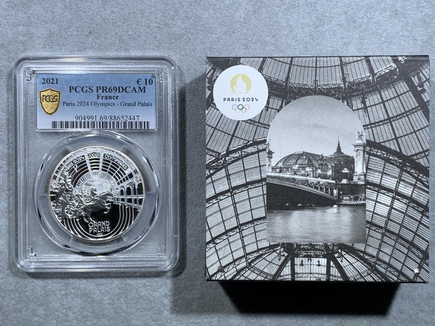 《竞宝斋》第326场 周日，周一，2场连拍 （全场包邮） PCGS PR69DCAM 法国2021年巴黎奥运会历史遗产系列-巴黎大皇宫10欧元精制纪念币（个人认为奥运会纪念币中最美丽的一枚，克重22.2克，999纯银，限量7500枚，盒证齐全）