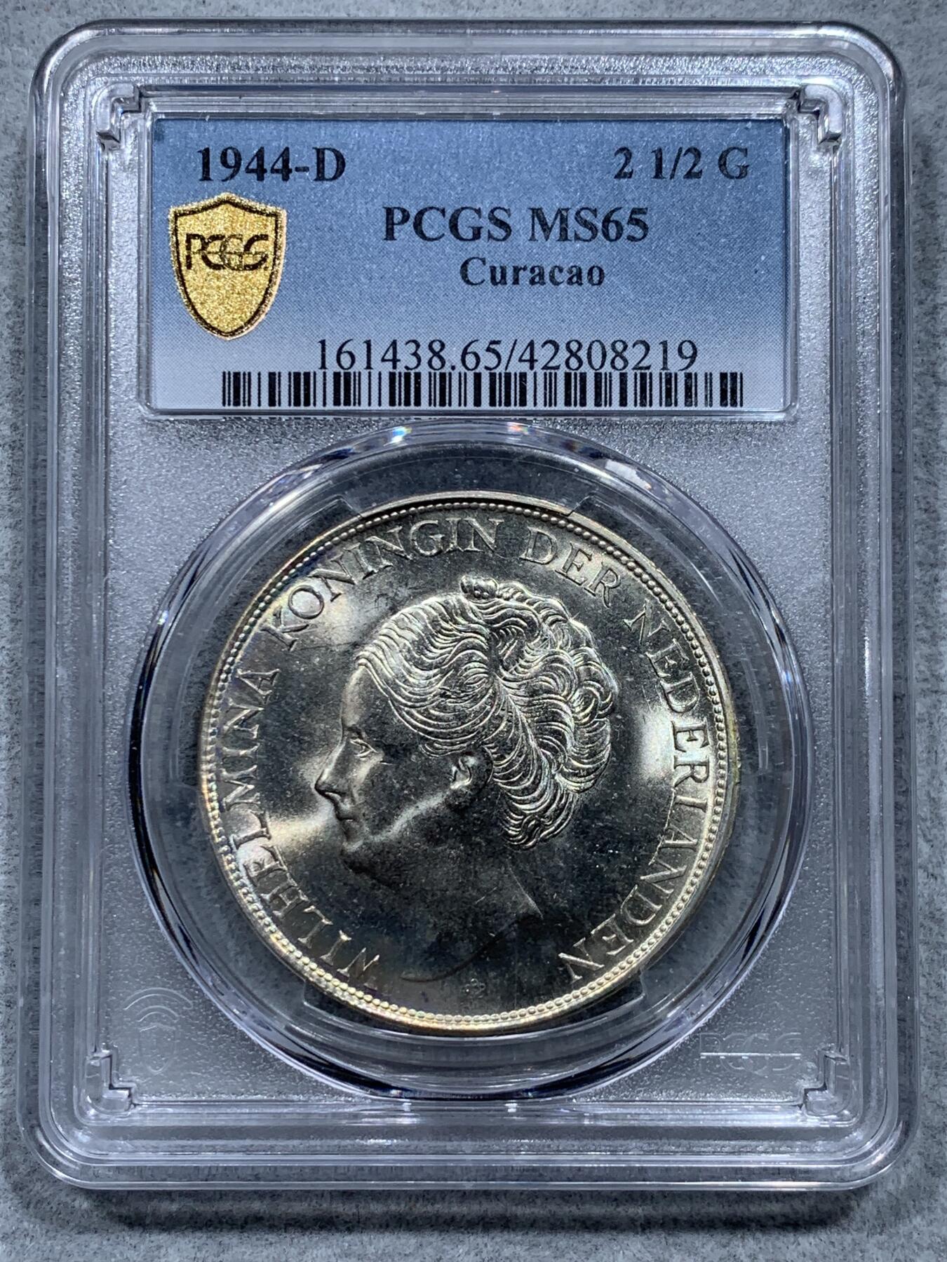 《竞宝斋》第327场 周日，周一，2场连拍 （全场包邮） PCGS MS65 荷属库拉索 1944年2.5盾大银币，一年版。十字曝光，状态极佳。更高分仅有4枚。HA拍卖P盒同分合人民币1864元成交