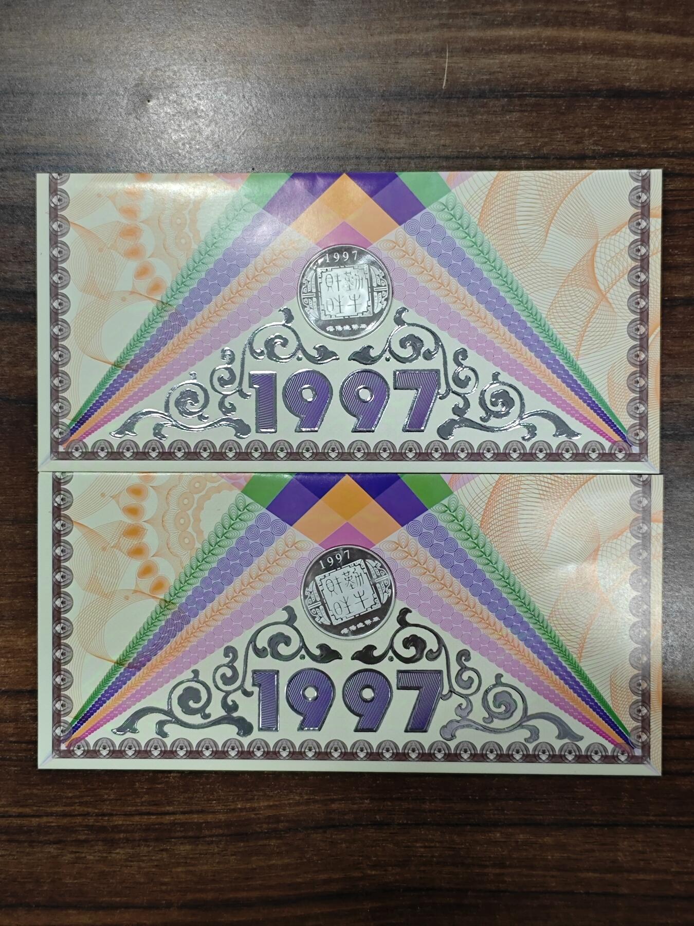 1997年沈币厂1/2盎司生肖牛纯银章贺卡原册2张标的是单价