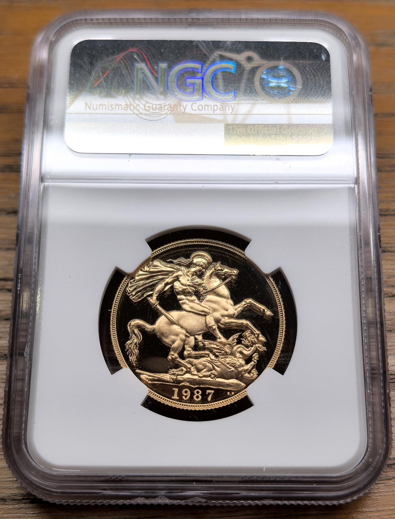 凡希社世界钱币微拍第二百九十期 1987英国马剑2镑金币精铸NGC-PF70UC，15.92g，917金。(视频参考)