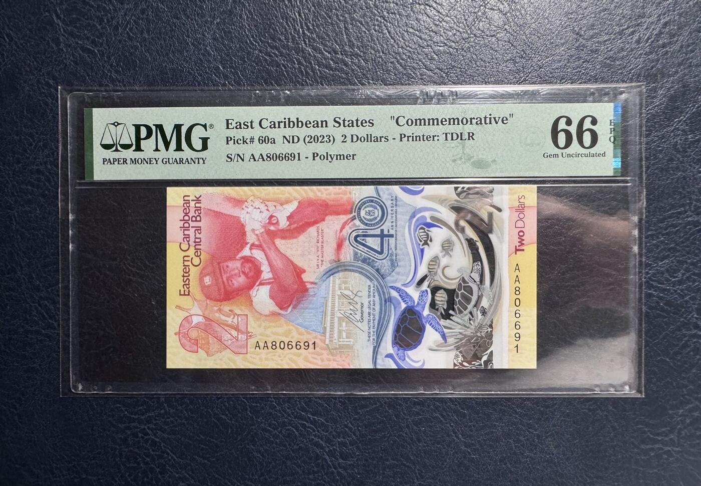 收藏联盟Quantum Auction 第392期拍卖  东加勒比2023年2元纪念钞首发AA冠 PMG66   IBNS获奖作品  倒置号 