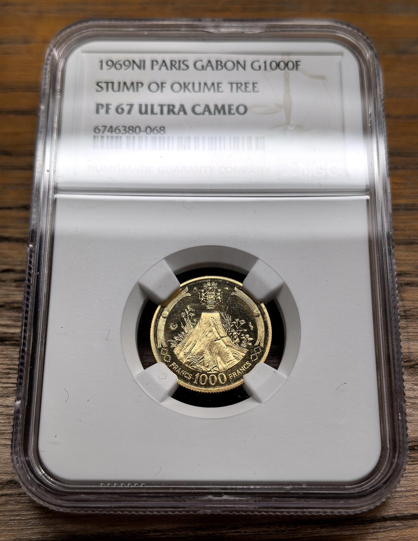 凡希社世界钱币微拍第二百九十期 1969加蓬共和国1000法郎金币NGC-PF67UC，非洲树木之王-奥克榄树桩，3.5g，900金