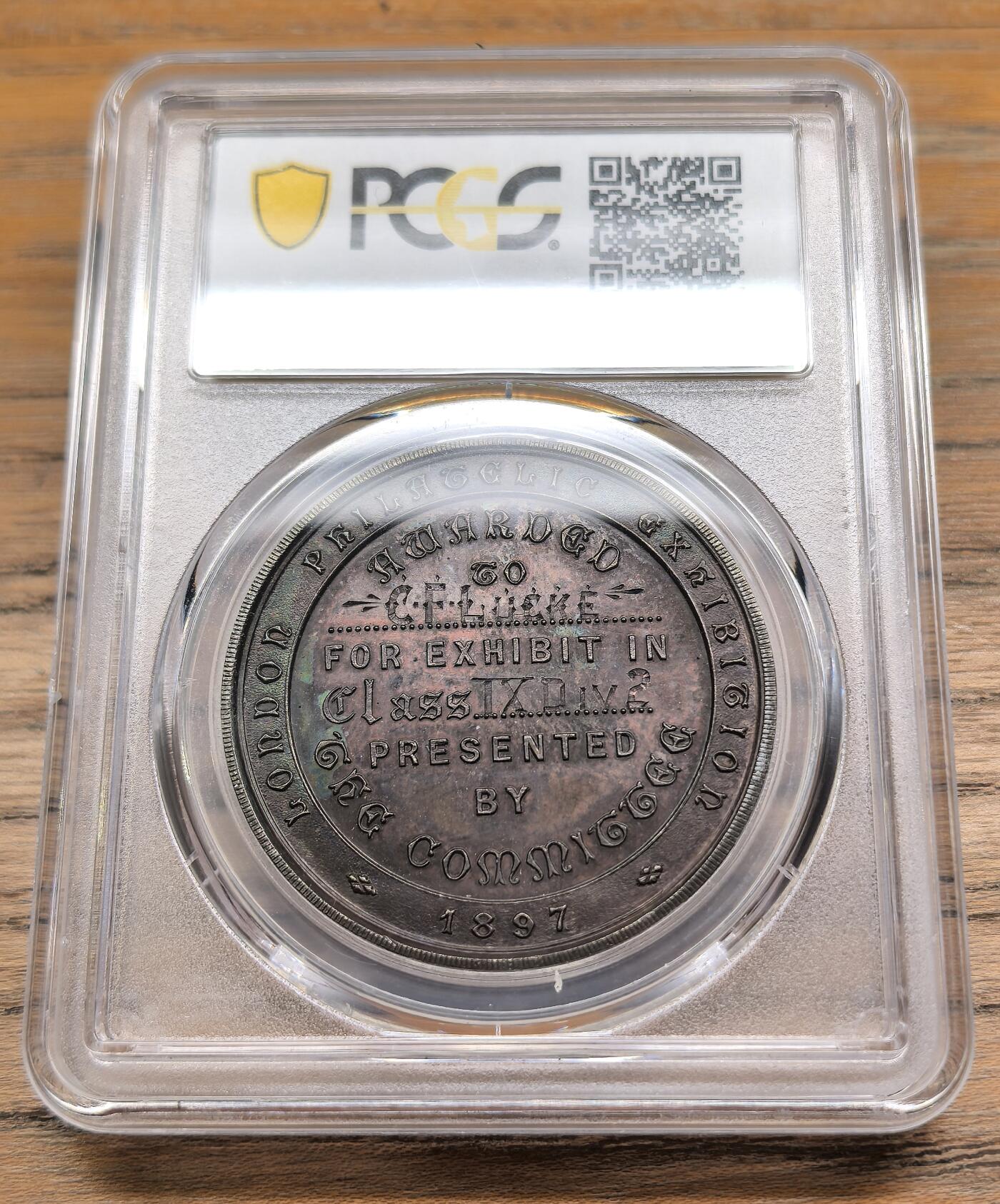 凡希社世界钱币微拍第二百九十期 1897英国邮展铜质奖章PCGS-SP63，双面洋红墨绿包浆。